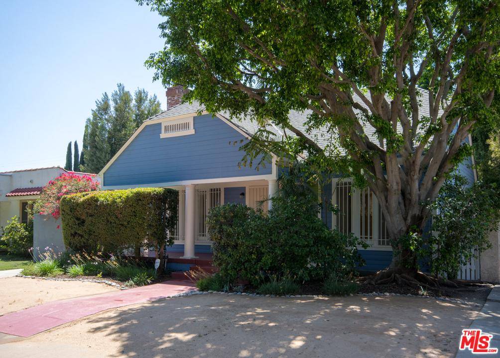 Get your LA vibe going in this charming Craftsman-style bungalow with a backyard so private you could sunbathe in it au natural