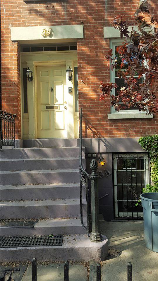 Historic charm meets urban elegance in this completely renovated Brick Townhouse stunner located in the Van Vorst Park