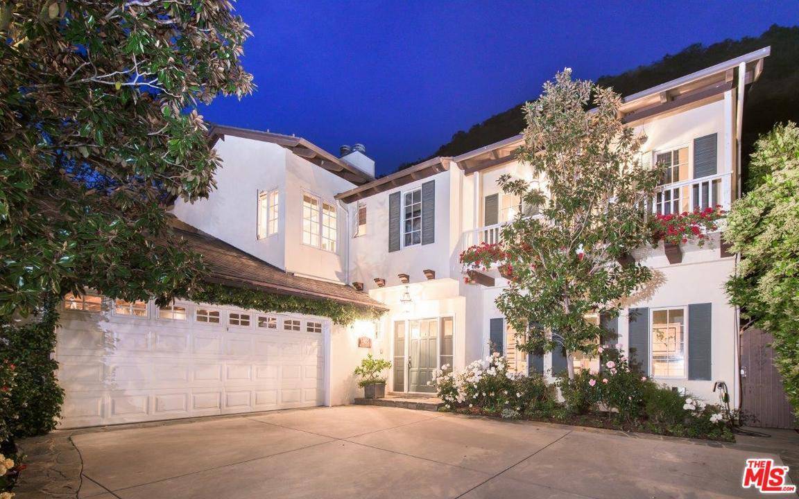 Located at start of private road this recently remodeled gated 5 bedroom California Monterey home is a wonderful family home