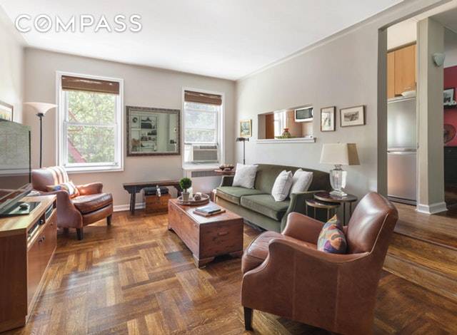 This elegant oversized 1 bedroom, 1 bathroom coop with a separate dining area and sunken living room is in a prestigious doorman building on one of Park Slope's premier streets.