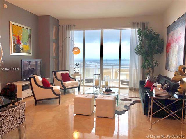 BREATHTAKING AND SPECTACULAR BAY AND CITY VIEWS ON THIS UNIQUE LUXURIOUS 1 BED/ 1