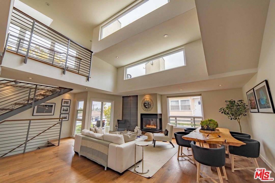 Exceptional end-unit architectural townhome capturing the very best of Santa Monica living
