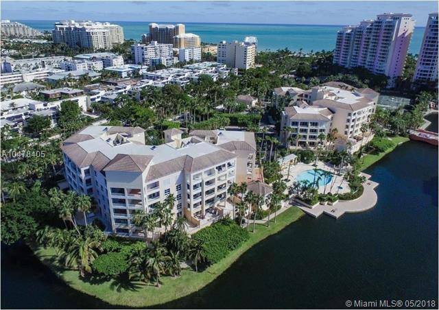 Direct waterfront unit 2BD/2BA with large balcony overlooking the lake in Resort Villa at Ocean Club