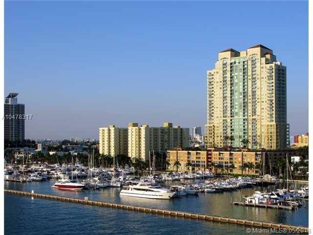 BEST PRICE AND 4% COMMISSION TO CO-BROKER - YACHT CLUB 1 BR Condo Miami Beach Florida