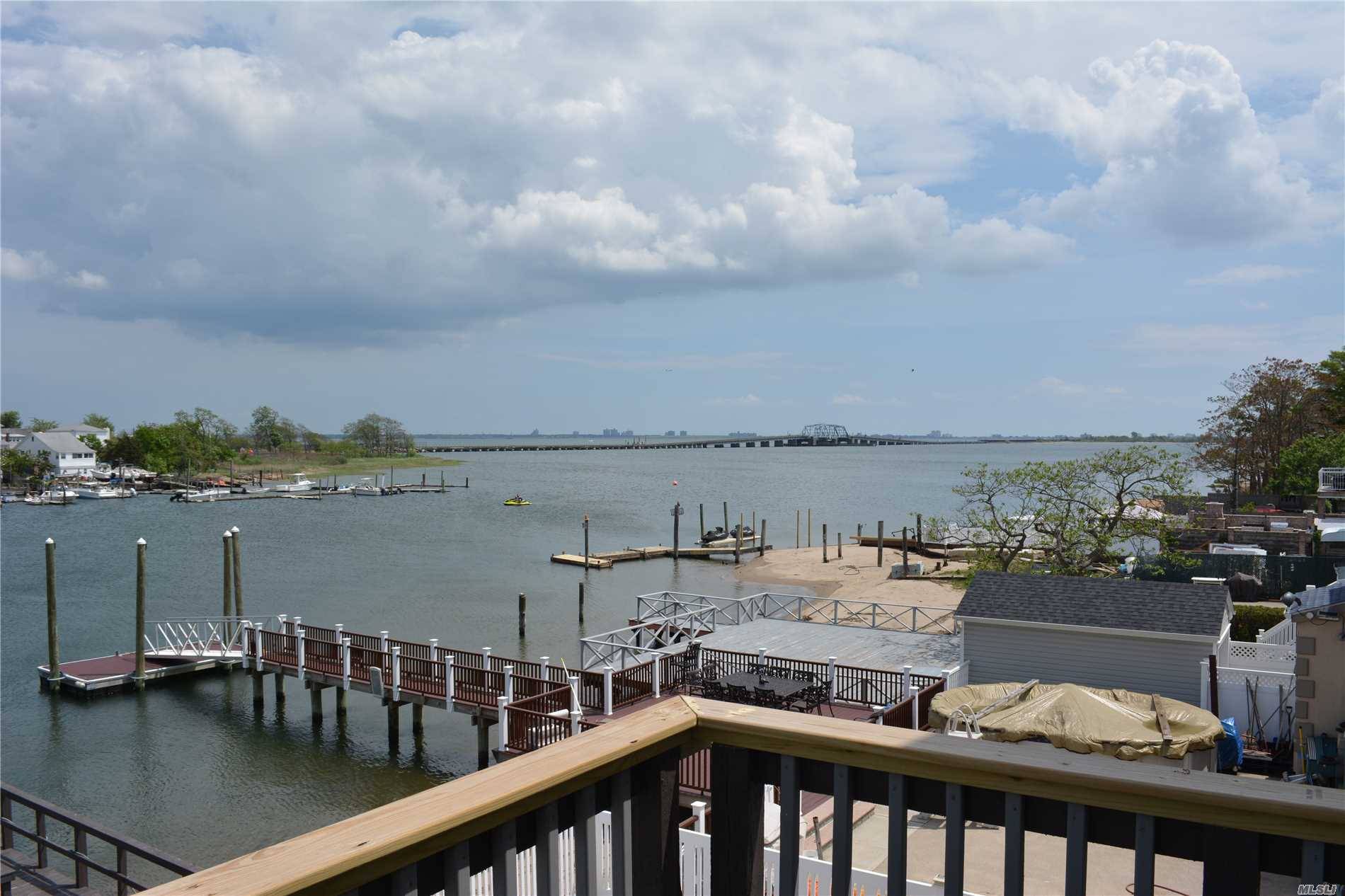 Rare Opportunity In Old Howard Beach On Canal With Floating Dock And Amazing Bay Views!