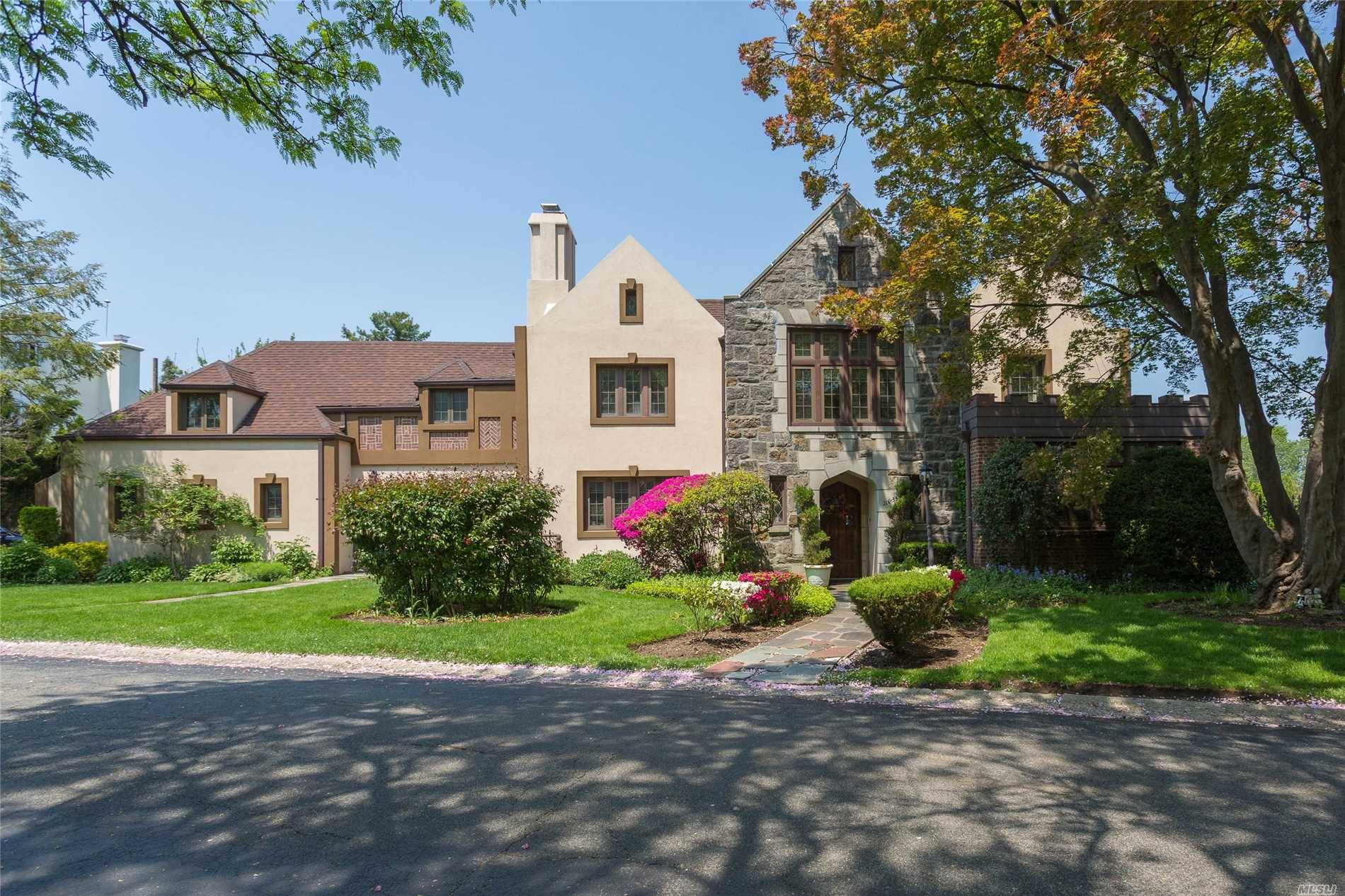 Magnificent Tudor On Over-Sized Lot Tucked Into The Enclave Of Bayside Gables.