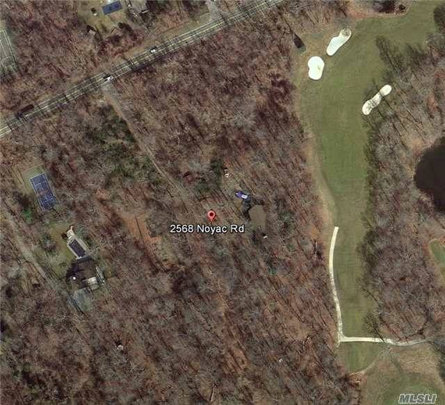 Wooded Buildable Lot Along Noyac Road And Adjacent To The 11th Hole Of The Noyac Golf Club.