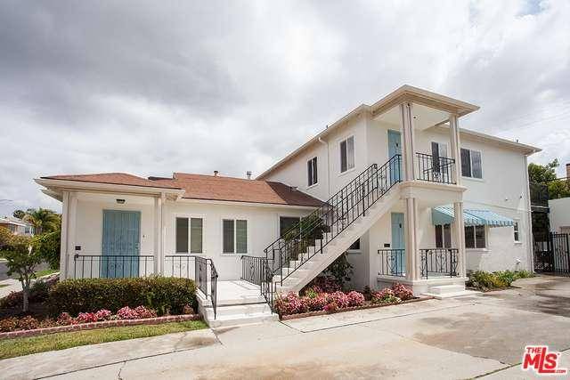 HUGE PRICE REDUCTION ON THIS NEWLY RENNOVATED TRIPLEX IN HEART OF MIRACLE MILE ON ONE OF BEST STREETS