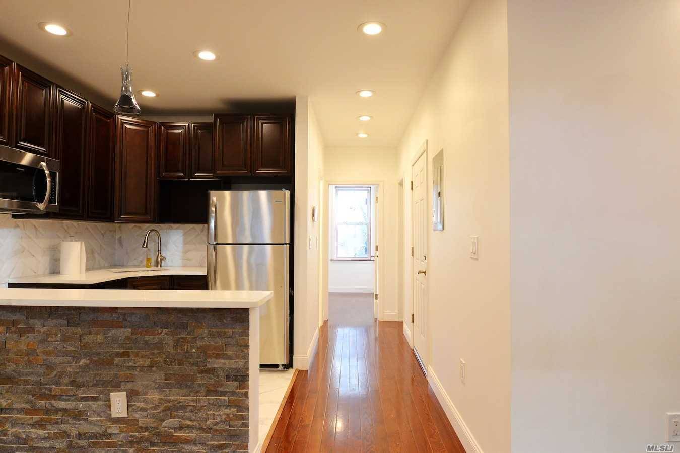 Located In The Williamsburg Neighborhood, This Newly Renovated Apartment (Approx.