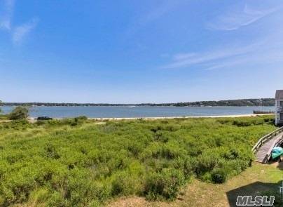 Great Opportunity To Own A Duplex Right On The Bay In Oyster Point With Views Of The Bay.