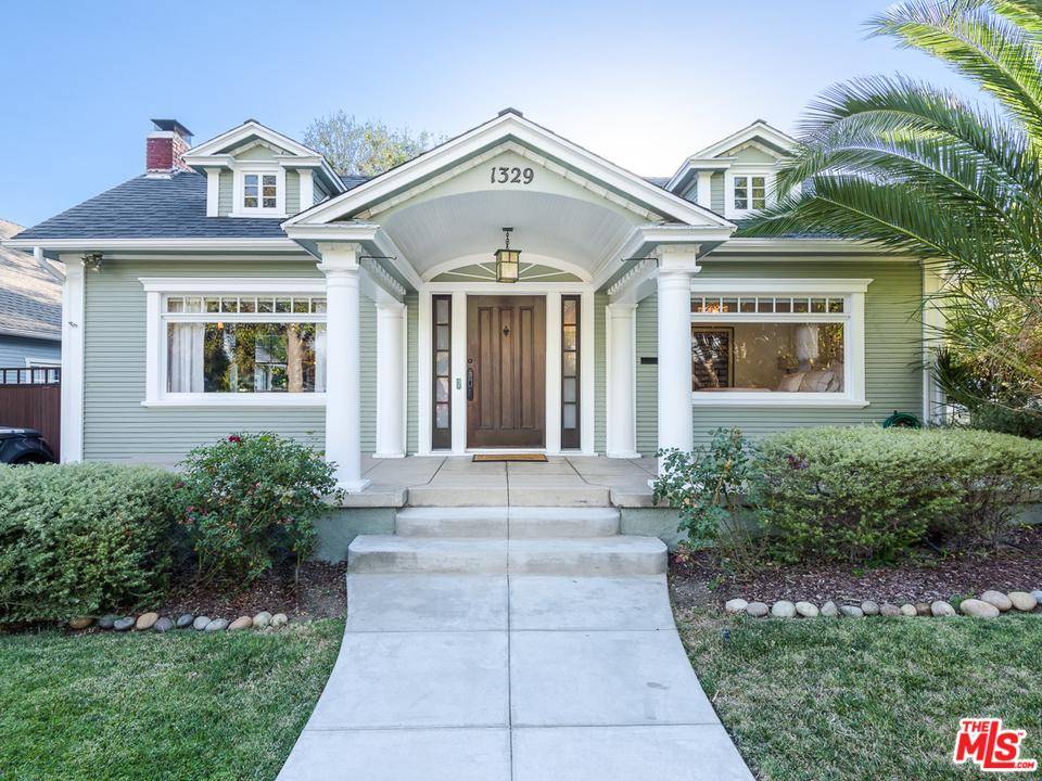 This Spaulding Square Craftsman exemplifies restoration at its finest in one of the most sought-after neighborhoods