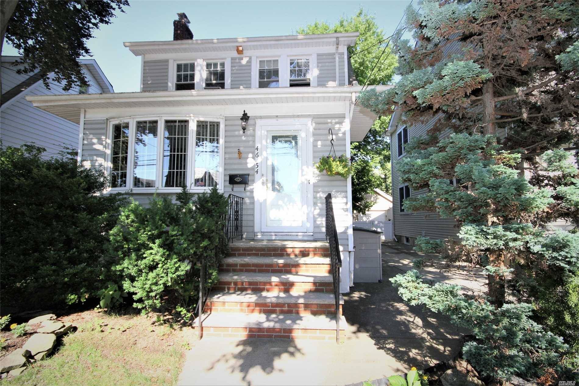Beautiful Detached Single Family Colonial In Prime Kissena Park Location.