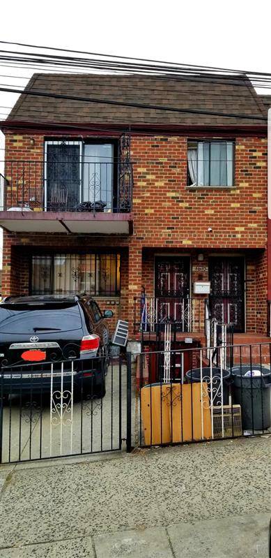 Located in the thriving neighborhood of Jackson Heights, this semi detached 3 family building has lots of potential.