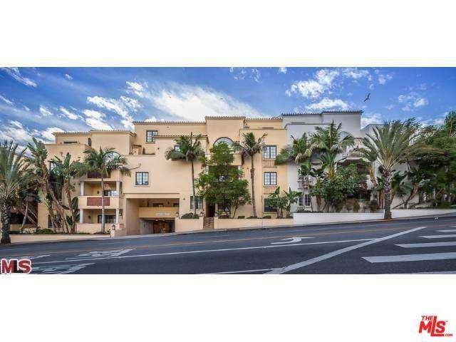 Newly remodeled front facing top floor townhouse in one of West Hollywoods best and most sought after buildings The Desmond