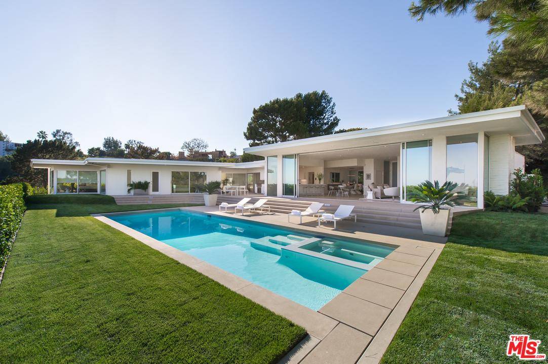 A REDEFINED CLASSIC TROUSDALE MID-CENTURY - Tremendous city and ocean views highlight this totally remodeled & updated property