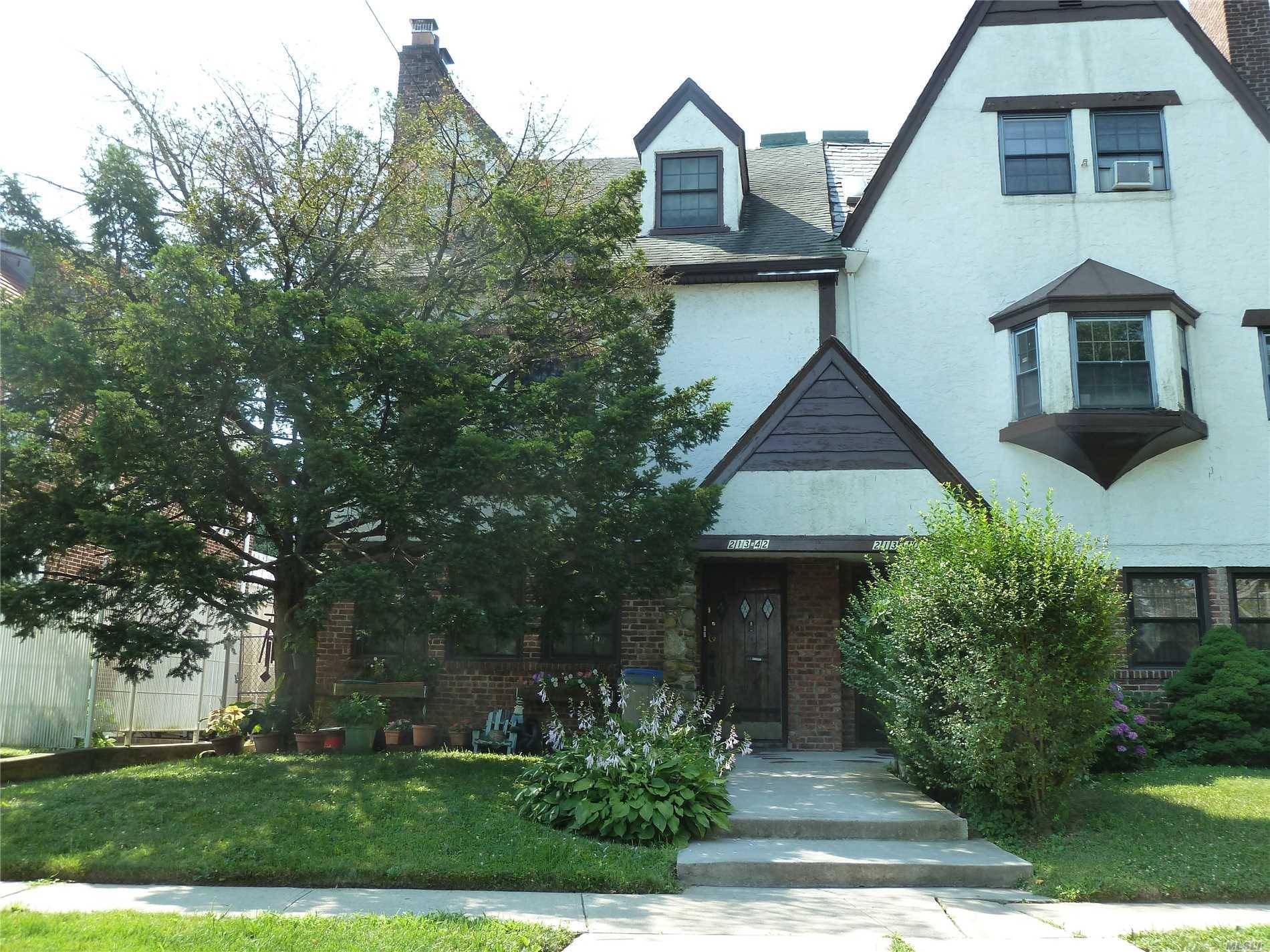 Beautiful 2 Family Tudor House Featuring 3 Bedrooms, 2.