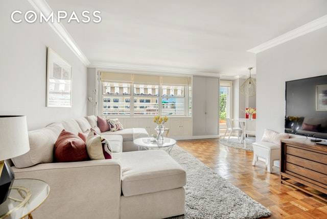 An amazing private South facing terrace is just the beginning of the outstanding features of this large one bedroom with dining alcove coop apartment on the Upper East Side.