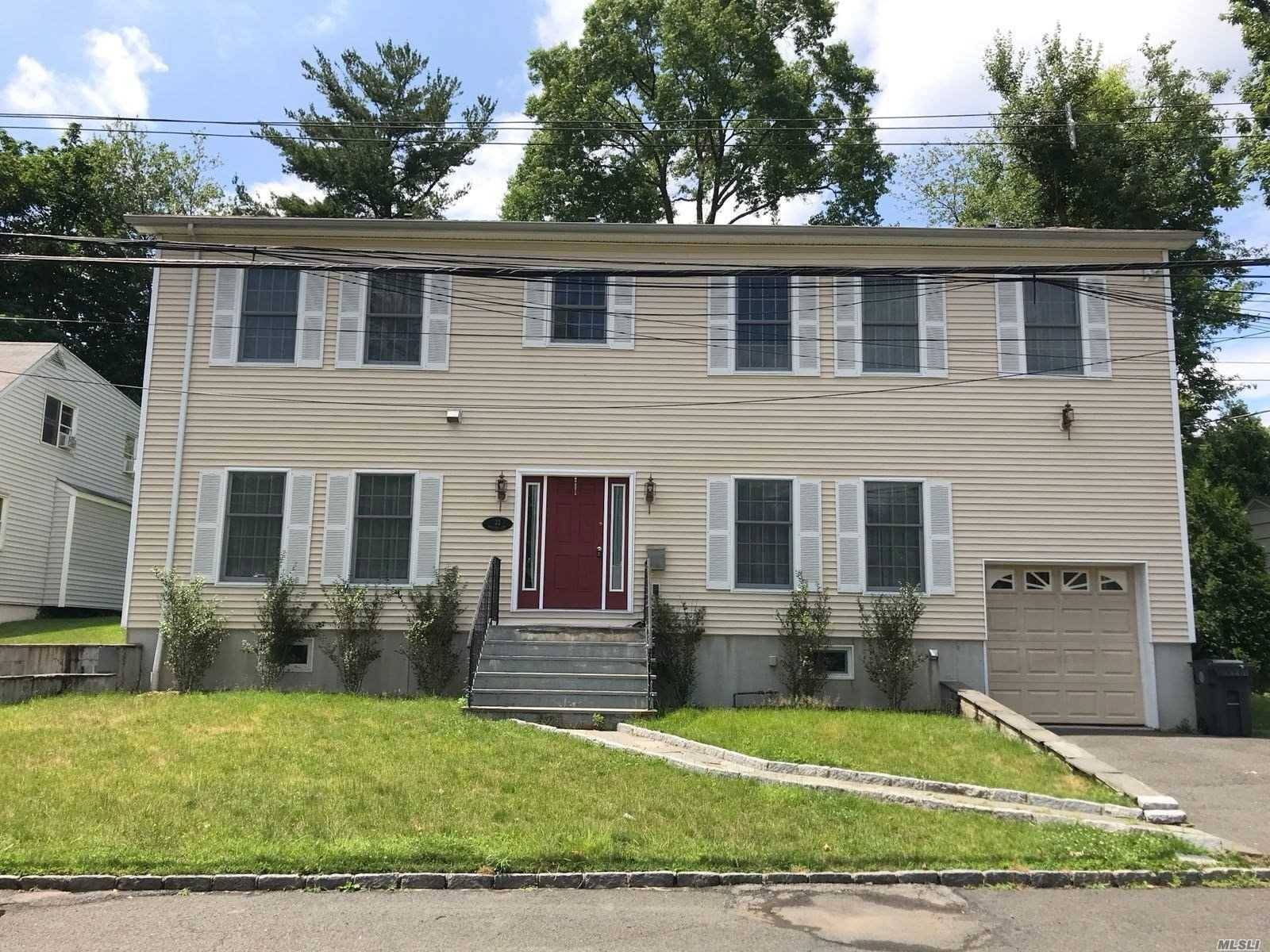 Detached Single Family Colonial With Attached 1 Car Garage Located In The Greenburgh Section Of Scarsdale.