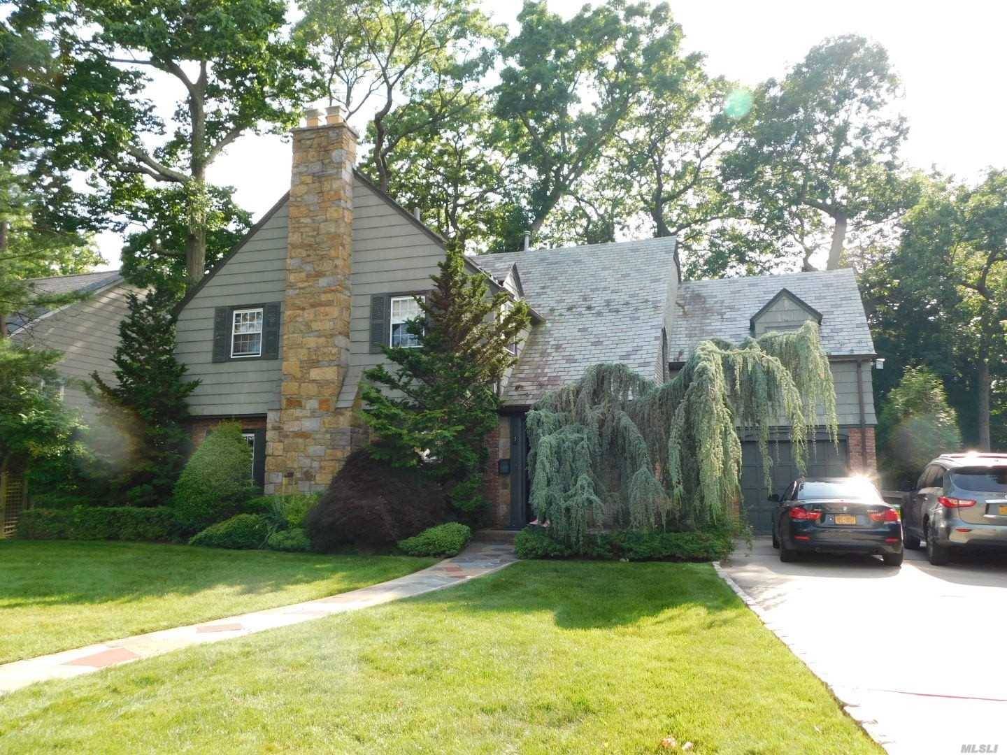 Grand Entry Colonial Situated On Exclusive Cul-De-Sac Block In Lawrence In A Park-Like Setting.