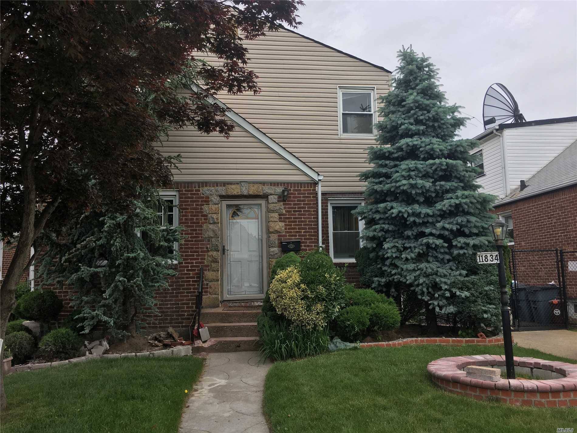 One Of A Kind Home In Cambria Heights Desirable Neighborhood 4 Bedrooms Up And 2 Bedrooms Down Finished Basement With Outside Entrance Professionally Landscaped Take A Look At This Home