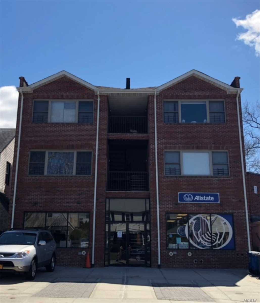 Mixed-Use Building With 2 Commercial And Office Floors & 2-Two Bedrooms Apts.