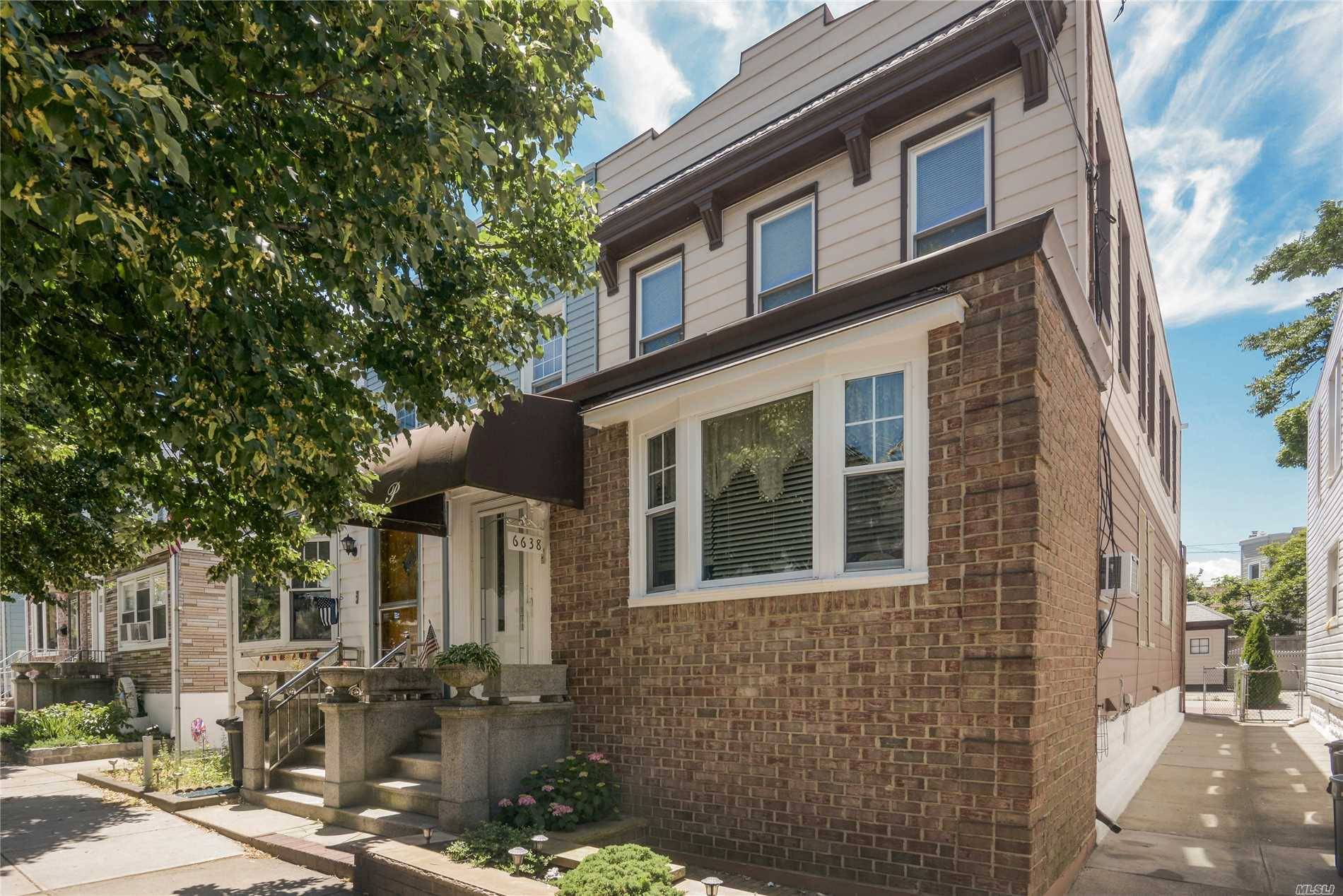 Great 2 Family Semi-Detch'd Home Located In The Heart Of Middle Village.
