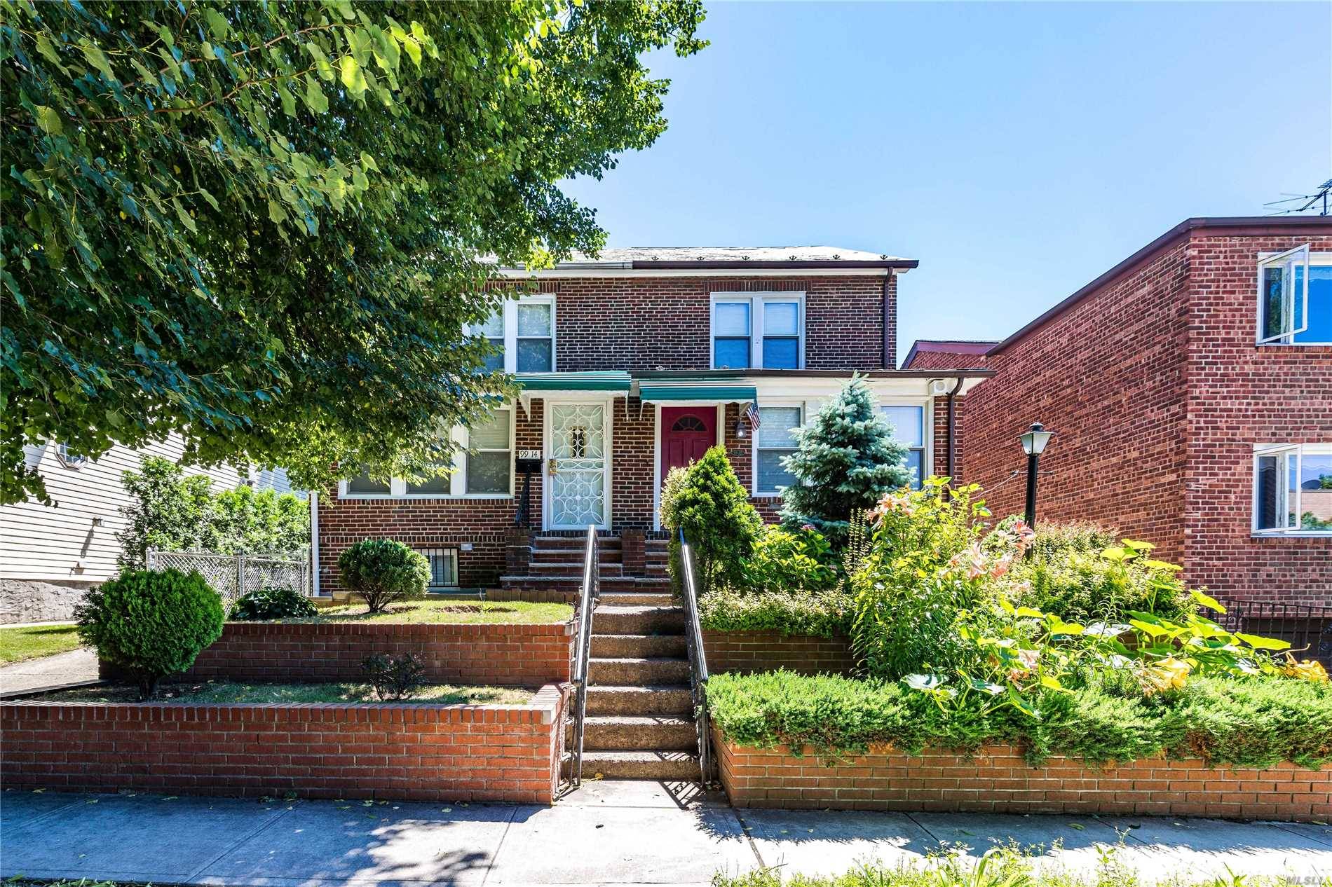 Fully Renovated Brick Semi-Detached House With Private Drive Way And 1 Detached Car Garage.