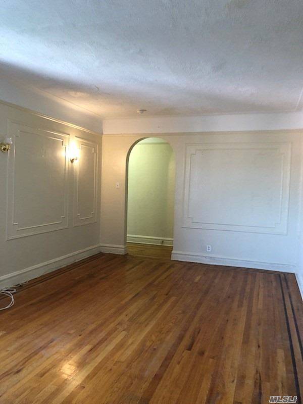 Newly Renovated Large One Bedroom Apartment With Hardwood Floors, 4 Closets An Eat In Kitchen And Lots Of Windows!