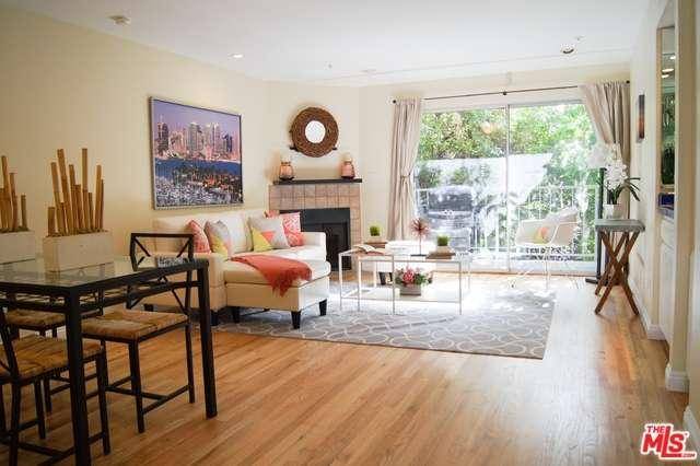 Gorgeous 2BD/2BA single level condo perched atop one of West Hollywood's most desirable street and minutes to the Sunset Strip