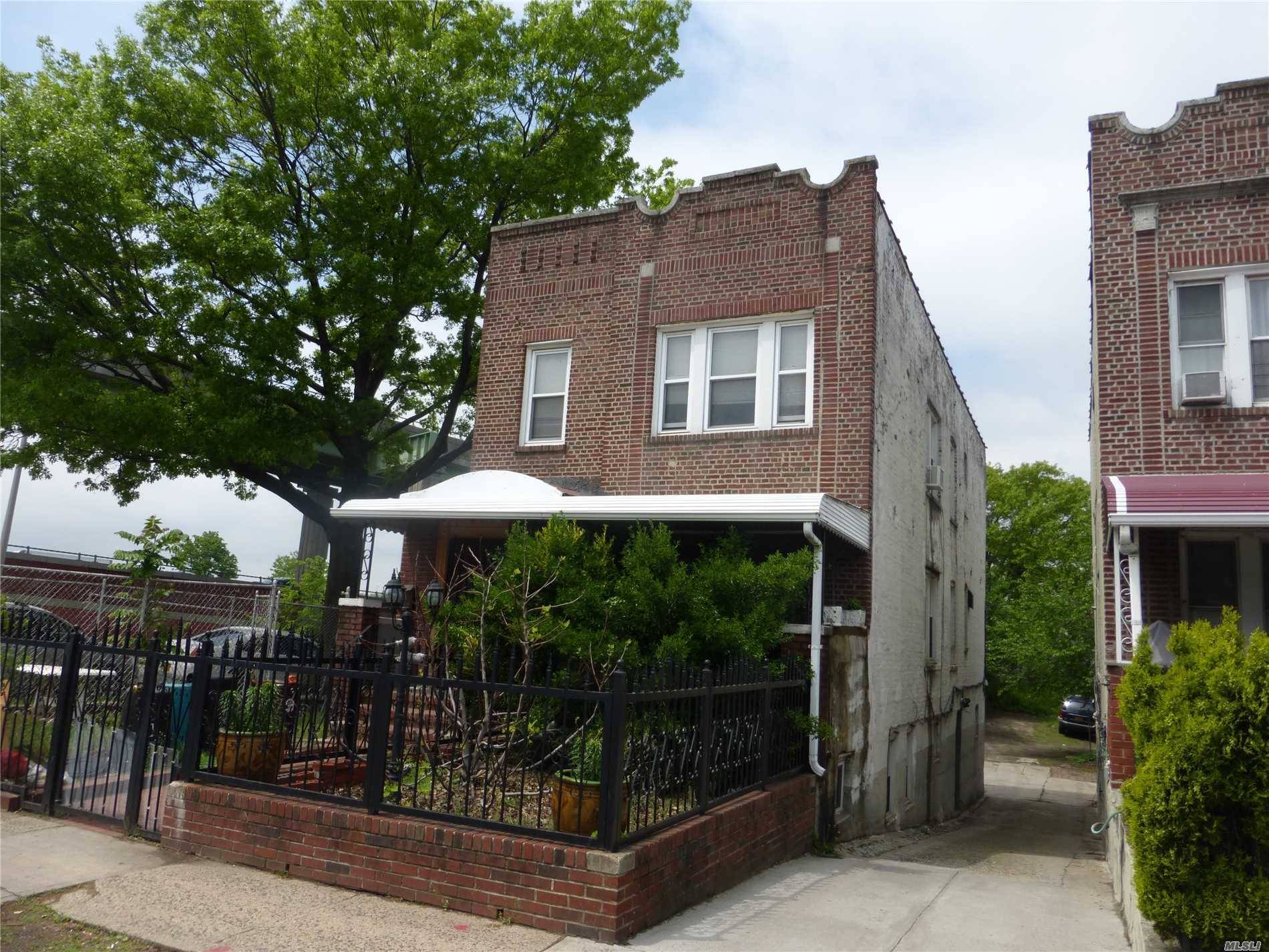 Great Opportunity: Large, Well-Maintained 2-Family Detached Solid Brick.