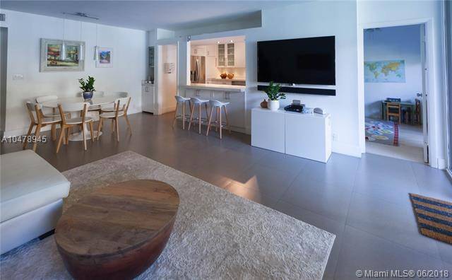Live steps to the beach in this beautifully renovated 3 bedroom