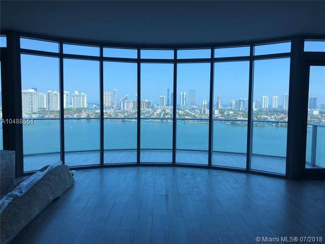 Beautiful duplex unit with astending ocean and skyline views at Marina Palms Residences South