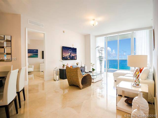 Beautifully designed and finished unit with direct ocean views from every room