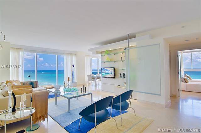 Enjoy luxury beachfront living in this 5BD/5BA unit with stunning panoramic ocean views