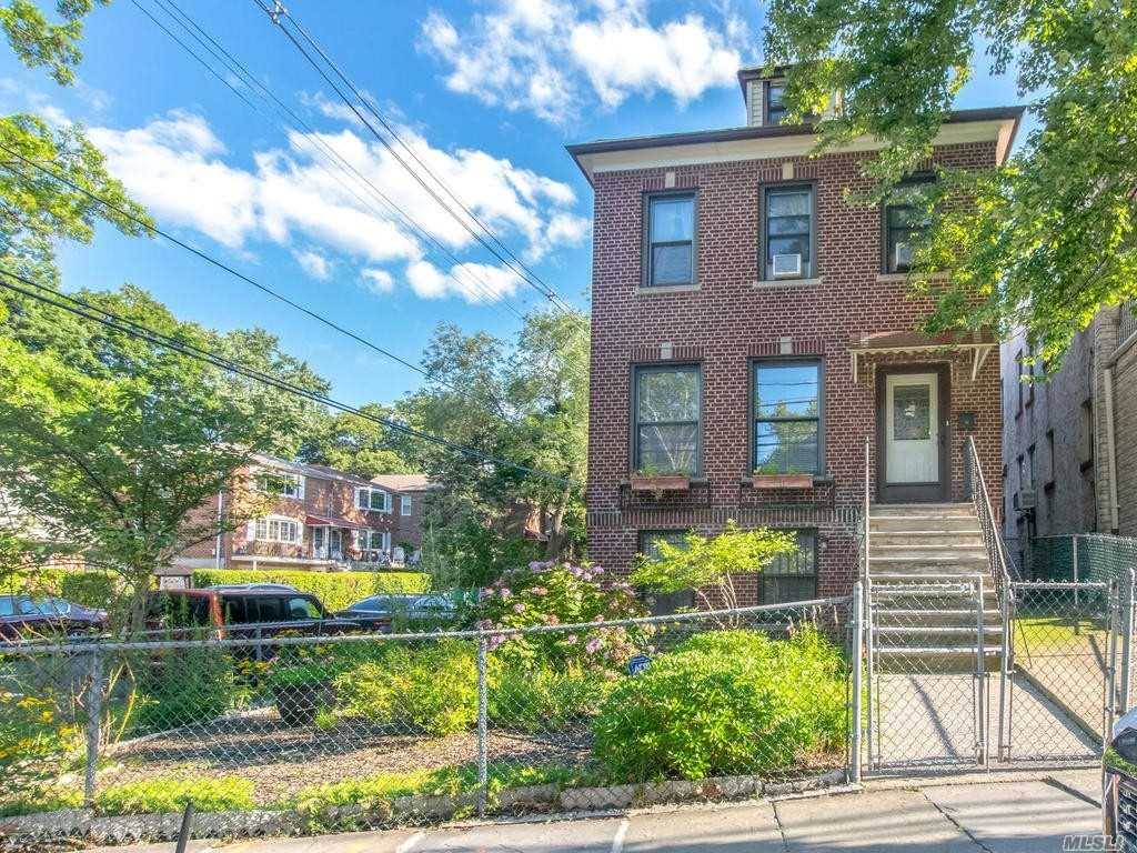 A Brick House On A Corner Lot In North Riverdale, Currently Being Used As A 2 Family Home, But Is Zoned For 3 Family.