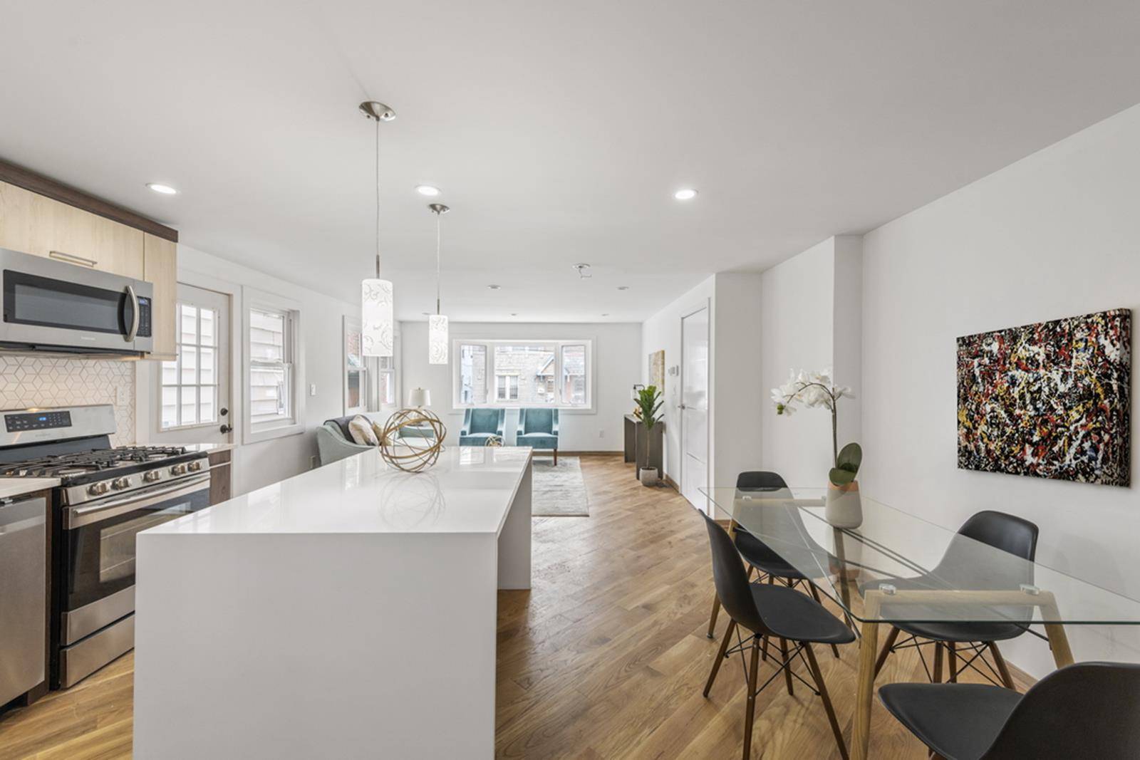 Nestled on a tree lined street in Woodside, Queens, 67 21 47th Ave is a fully detached 2 family house graced with an abundance of natural light and a thoughtful ...
