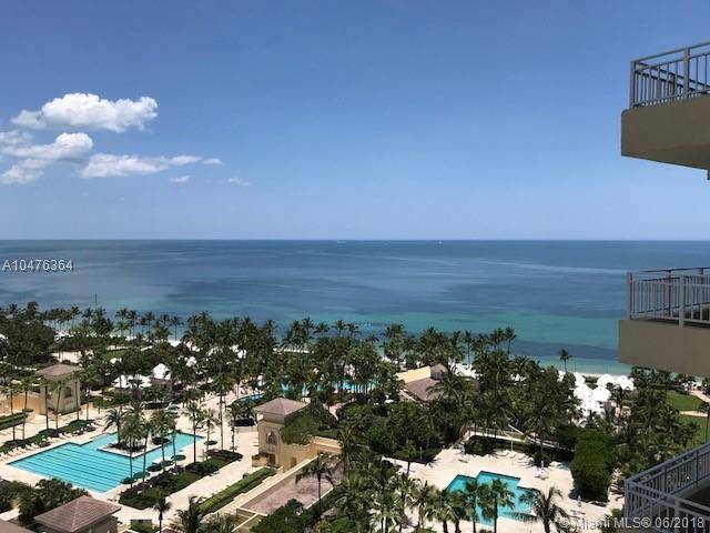 THRILLINGLY BEAUTIFUL BEACH AND BAY VIEWS FROM THIS SUB-PENTHOUSE AT OCEAN TOWER I IN PRESTIGIOUS OCEAN CLUB IN KEY BISCAYNE