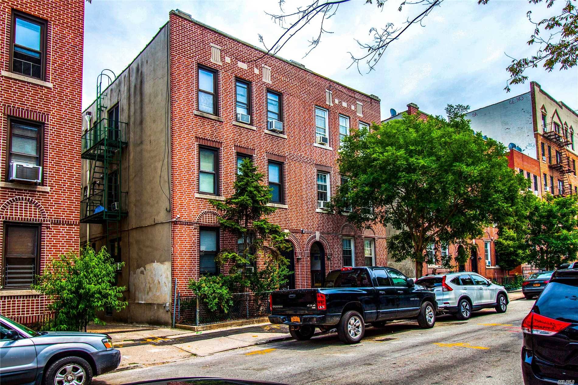 Rare Free Market Rent Legal 6 Family Brick Building In Prime Woodside, No Units Are Under Rent Stabilization Which Means High Income.