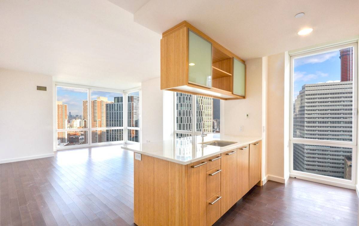No Broker Fee!!!  Limited Time Only!!!    Brilliant Battery Park City 2 Bedroom Apartment with 2 Baths featuring a Fitness Center and Rooftop Deck