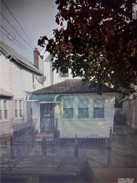 House Is 2 Family 2 Bedrooms Over 2 Bedrooms With A Basement.