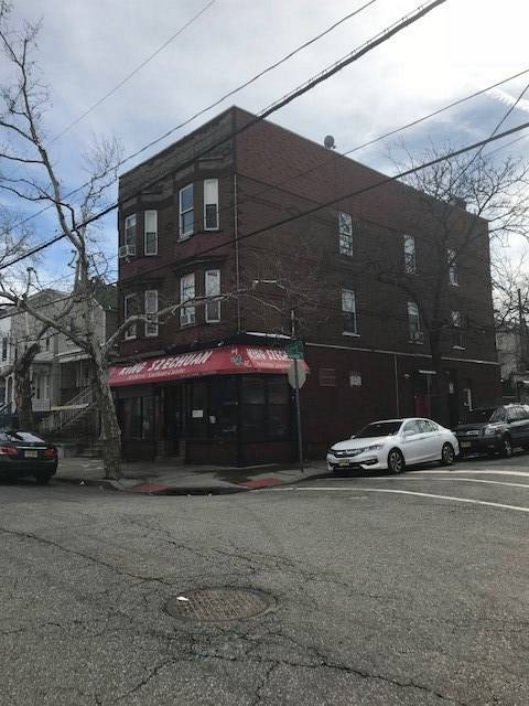 Prime Heights corner location-store + 5 Apartments + 2 garages