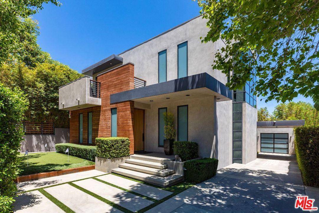 Chic and modern architectural estate sits on one of the best streets in West Hollywood with a short walk to the best dining