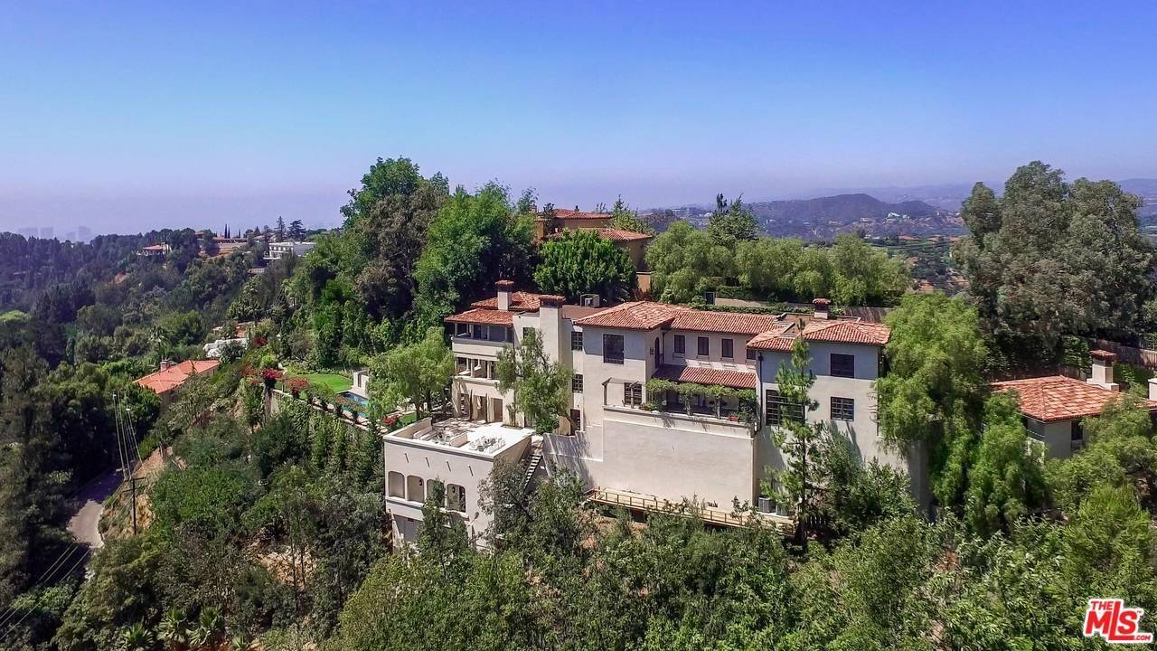 One of a kind sprawling gated European Villa situated on over one acre of land in prestigious Bowmont Estates