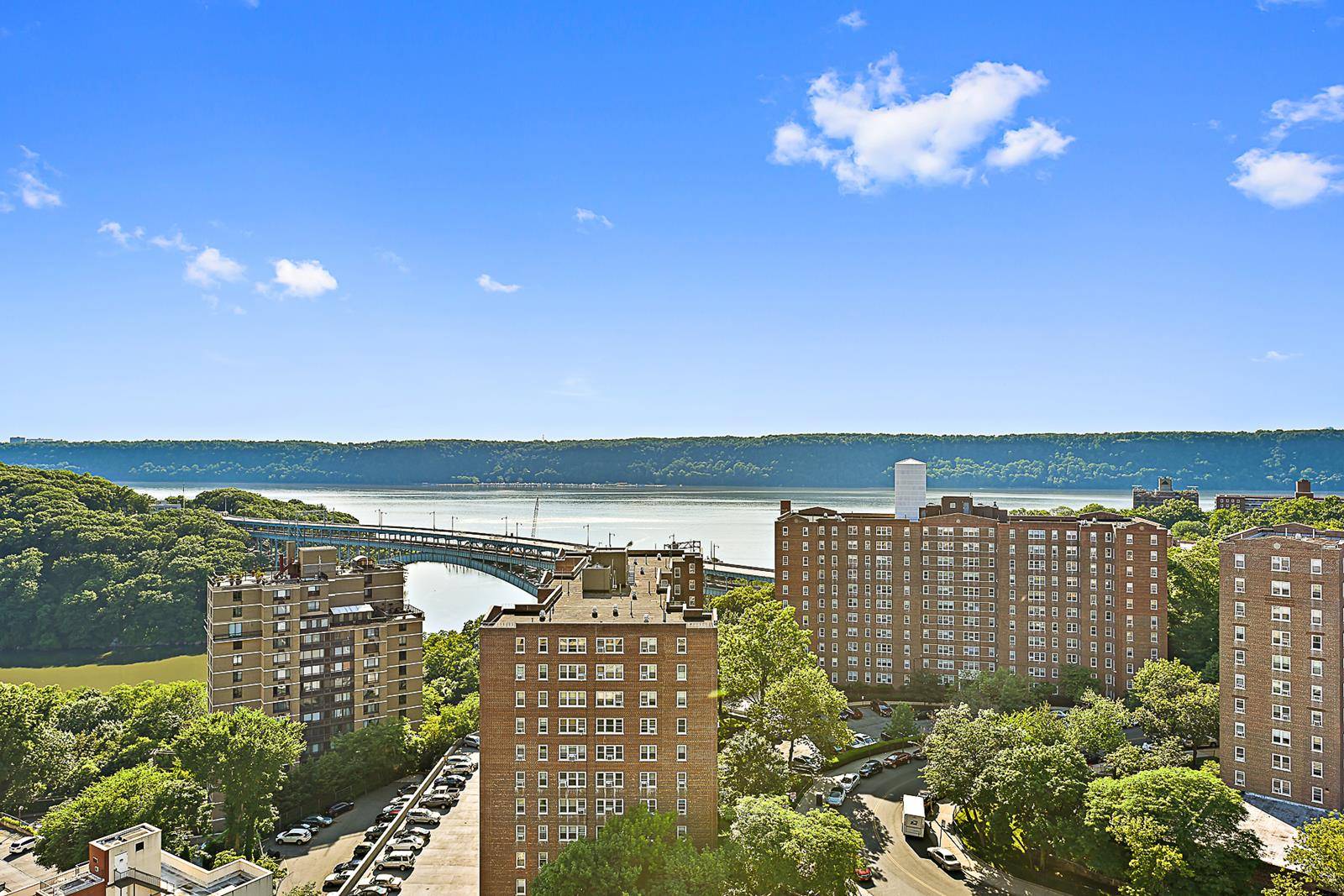 Stunning complete renovation of spacious, bright two bedroom two bath co op with western exposure and expansive Hudson River views.