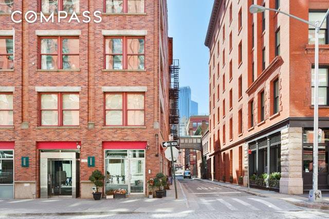 Step out onto your own private wraparound terrace from the master suite of this sophisticated duplex penthouse available in the heart of Tribeca's historic district.