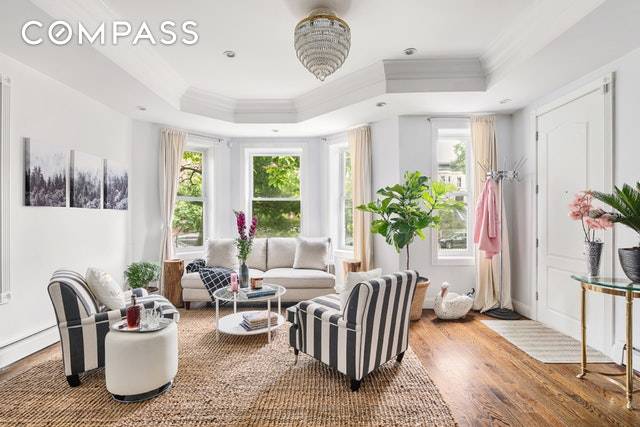 Welcome to 142 Lenox Road, a 23 foot wide, majestic limestone two family home in Prospect Lefferts Gardens.