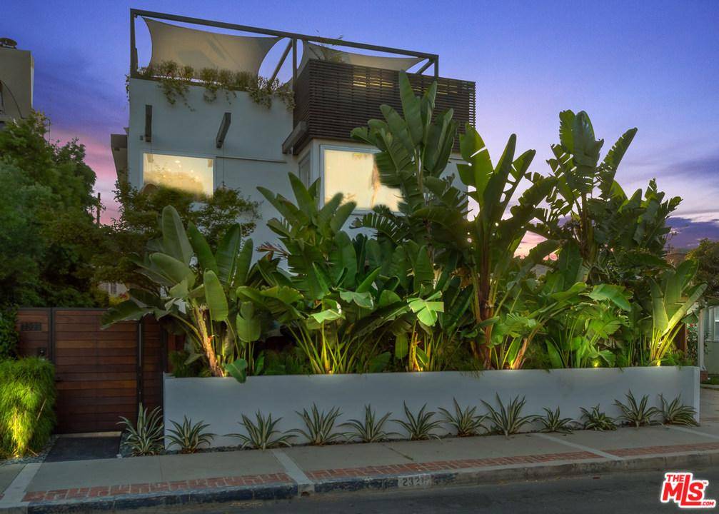 Warm modern home with incredible scale and designer finishes situated in the Silver Triangle of Venice Beach