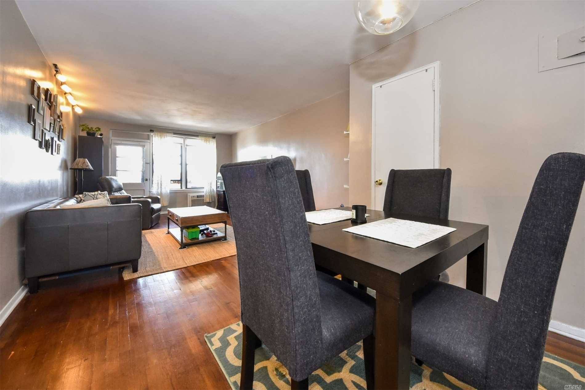 Top Floor Spacious Unit With Private Balcony, Hardwood Floors, Stainless Steel Appliances, And Ample Kitchen Cabinets.
