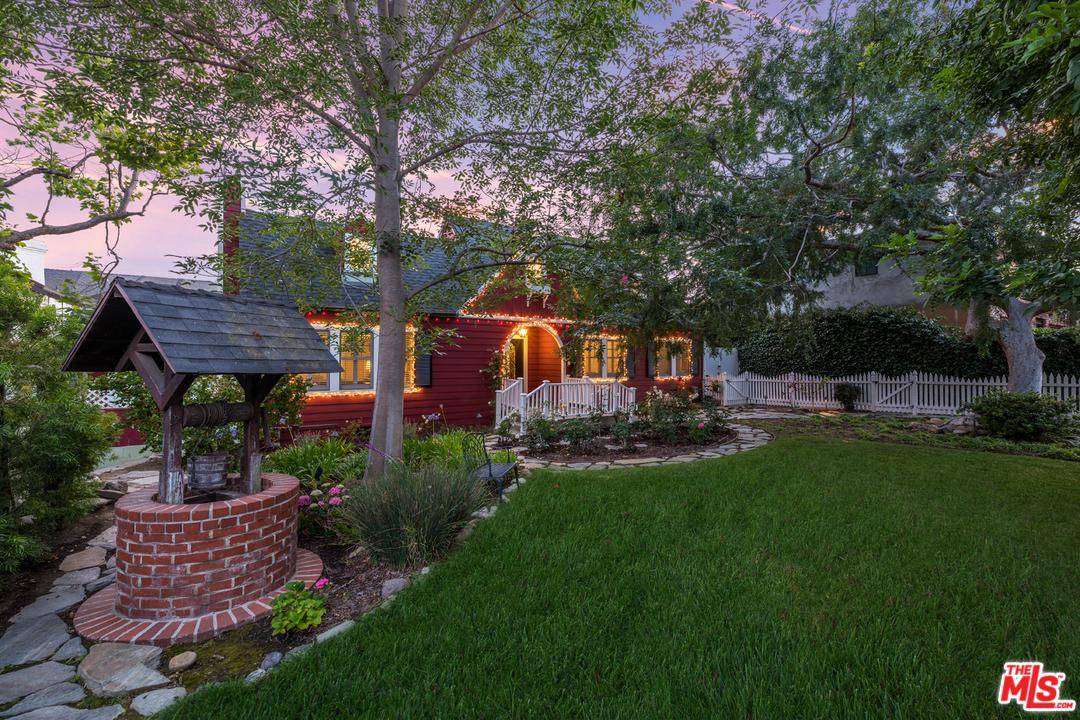 Fall in love with this classic farmhouse on arguably Mar Vista's best street