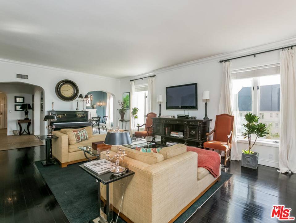 Stunning designer-furnished remodeled corner unit with gorgeous views of the city and hills in the historic Granville Towers